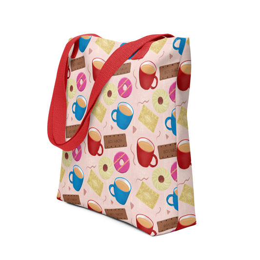 Tote bag with red handle and colourful tea cup and biscuit pattern by Carmel Rimmer on a white background